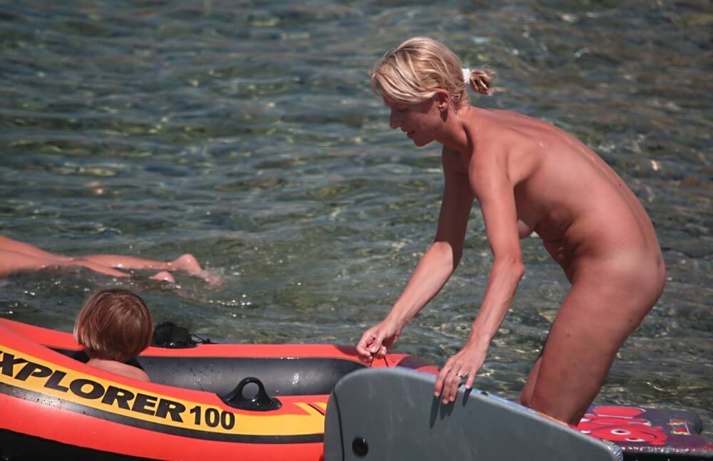 Red Boating for Two Nudists pics - Activities conducted in a state of complete nudity