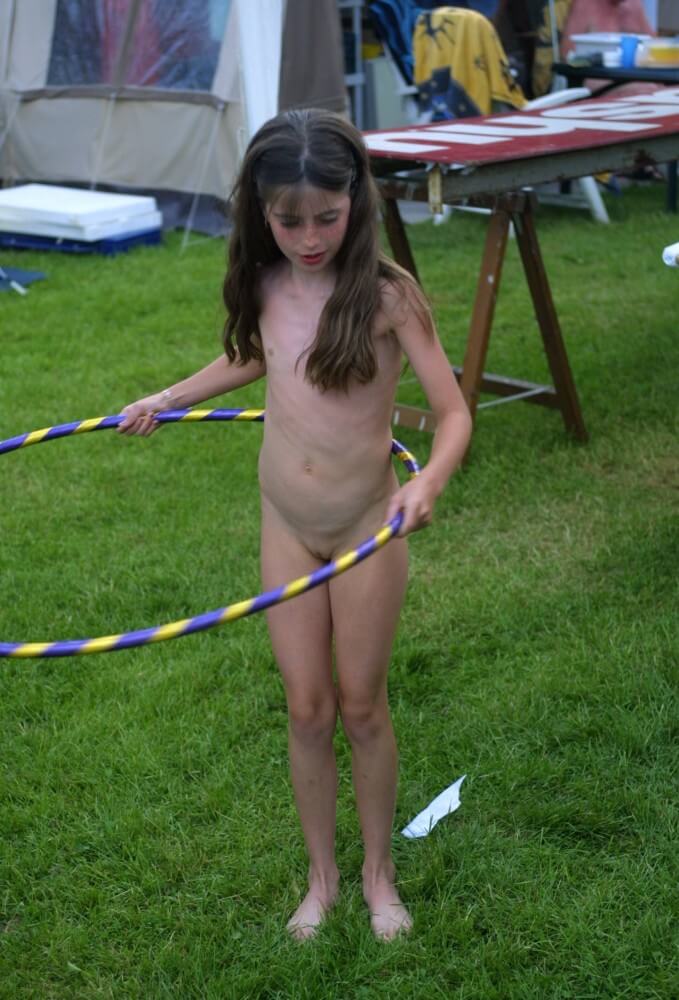 Holland Grass Hula Hoops pics - People come together in unity with nature to take off their clothes