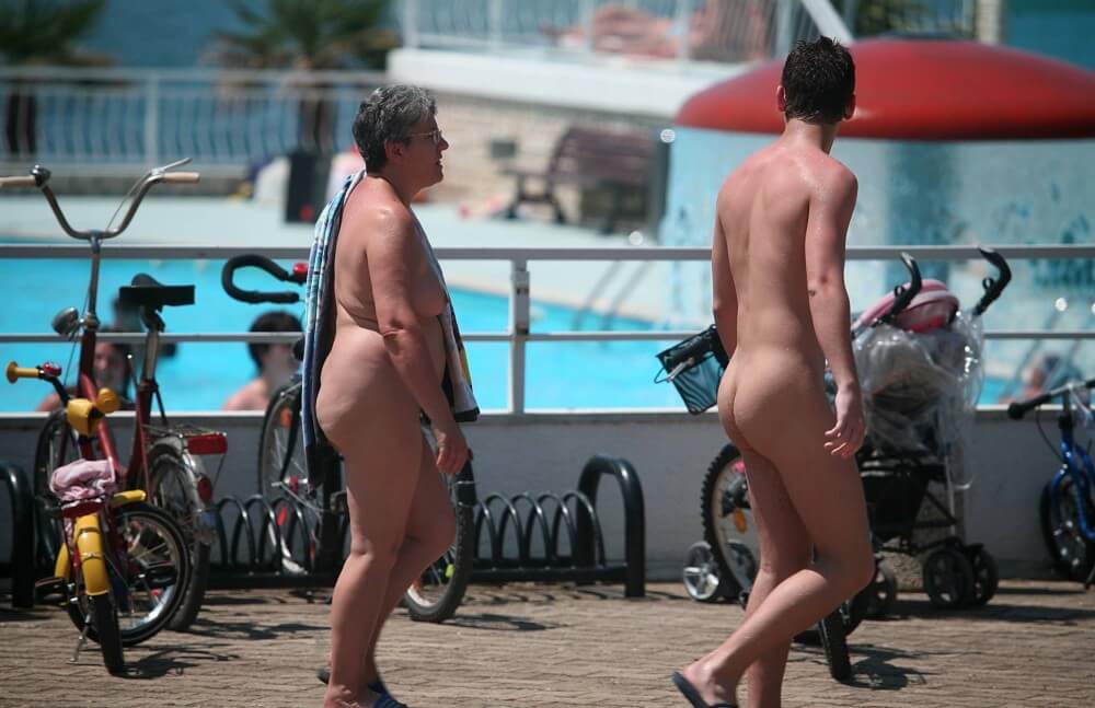 Sun-Soaked Sidewalk pics - Beautiful family nudism