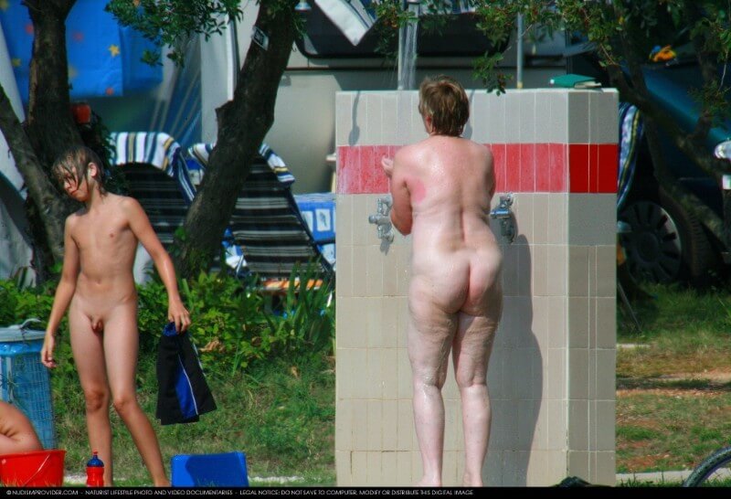 Covered in Towel Nudists-Boardwalk Biking - Nudity is a part of life without shame