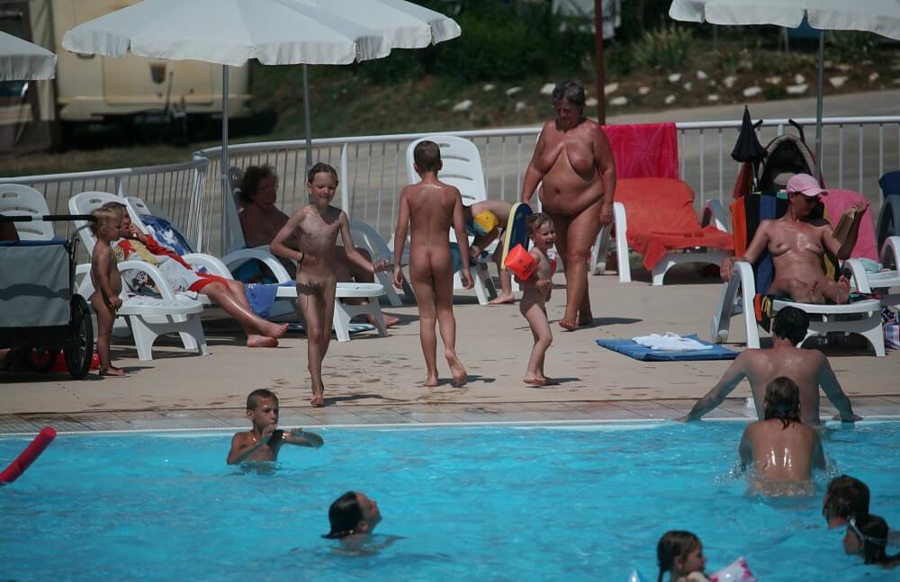 Naturist Afternoon Pool Games pics - Naturism as a Way to Connect with Nature