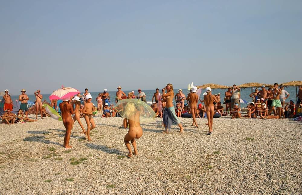 Ribbon and Umbrella Dance pics - The practice of nudism promotes freedom from fears and insecurities