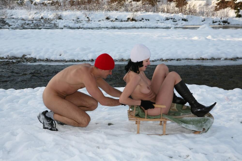 Naturist Girl Snow Day Couples Sled pics - A nudist values trust and friendliness among people