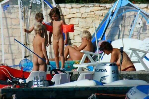 By the boat photos - A true nudist vacation