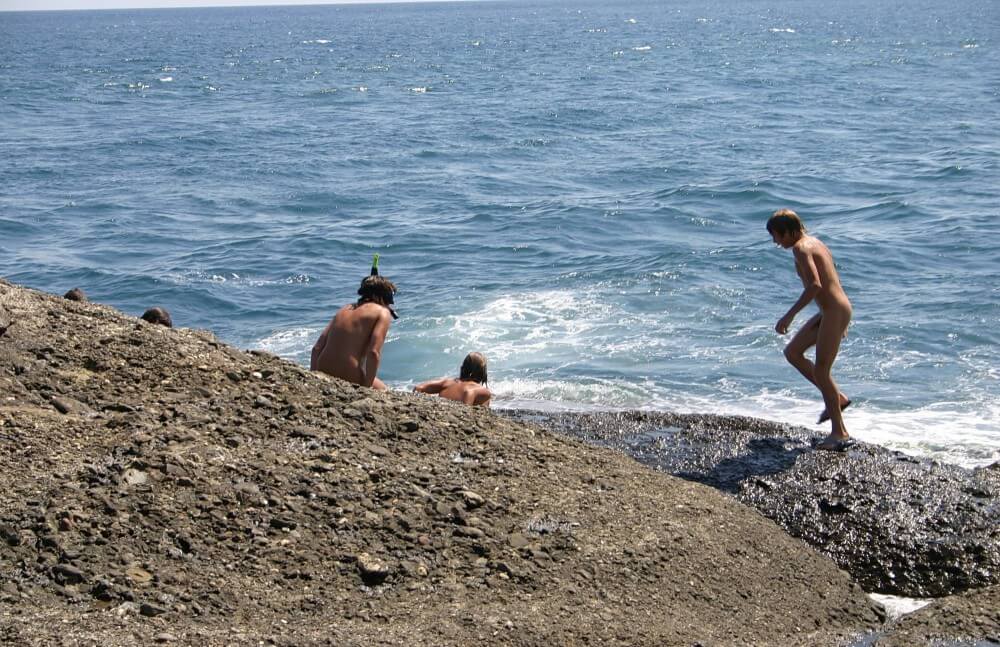 Leaning Against Hit Rocks pics - The practice of nudism helps us shed imposed stereotypes and insecurities